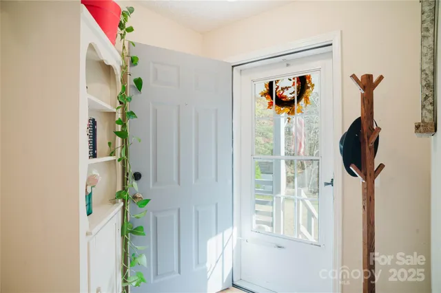 a kitchen with stainless steel appliances granite countertop a refrigerator and a stove
