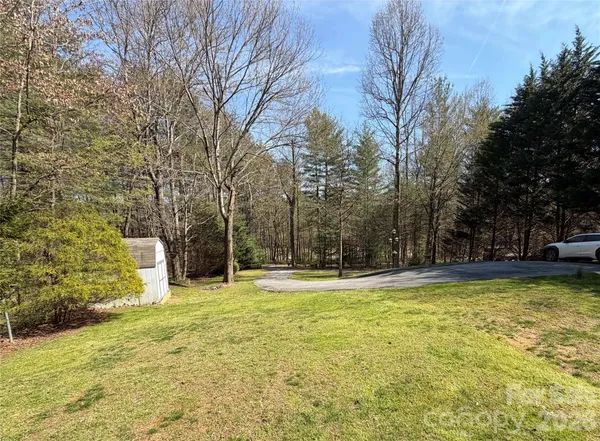 $394,000 | 107 Sugar Mill Woods Drive, Zirconia, NC 28790