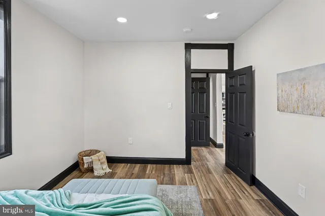 a spacious bathroom with a bathtub and a shower