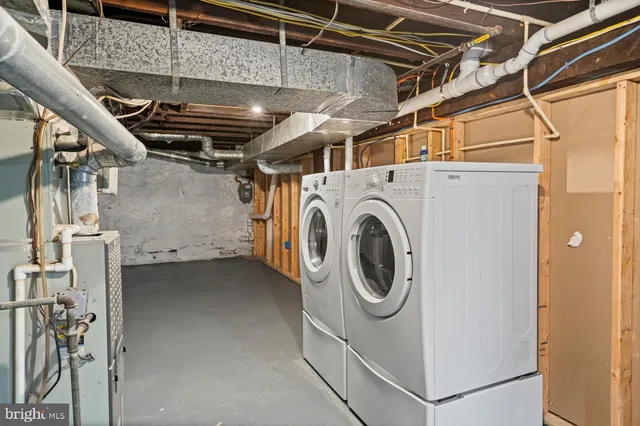 a view of hallway with wooden floor