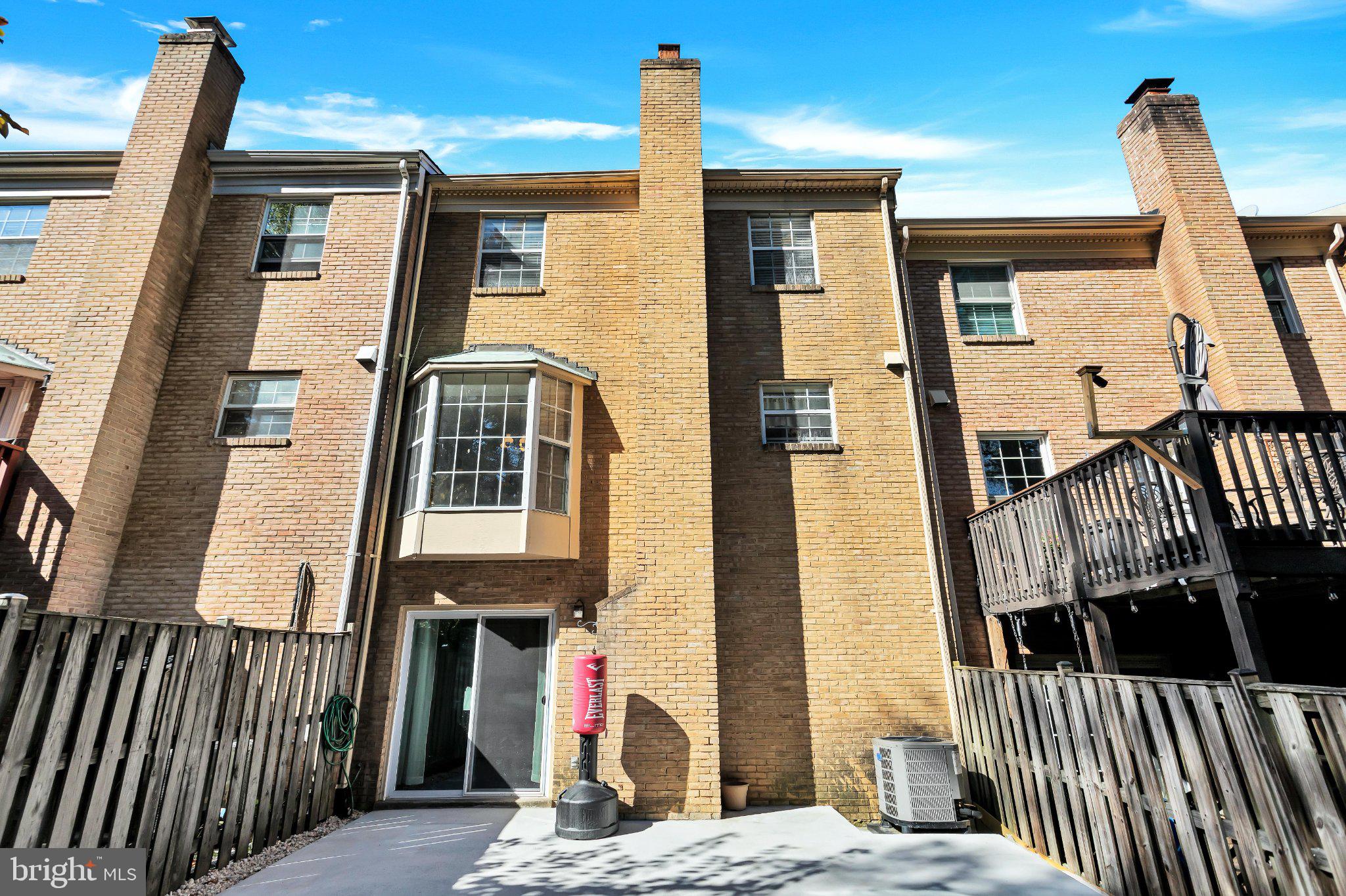9009 Sweet Birch Court Springfield, VA 22152 - Photo 34 of 34 Charming brick facade with outdoor space.