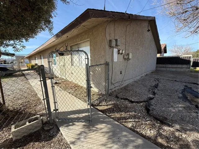 a house with trees in the background