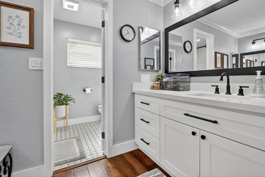 11611 Southwest 52nd Street Cooper City, FL 33330 - Photo 28 of 45 a bathroom with a sink and a mirror