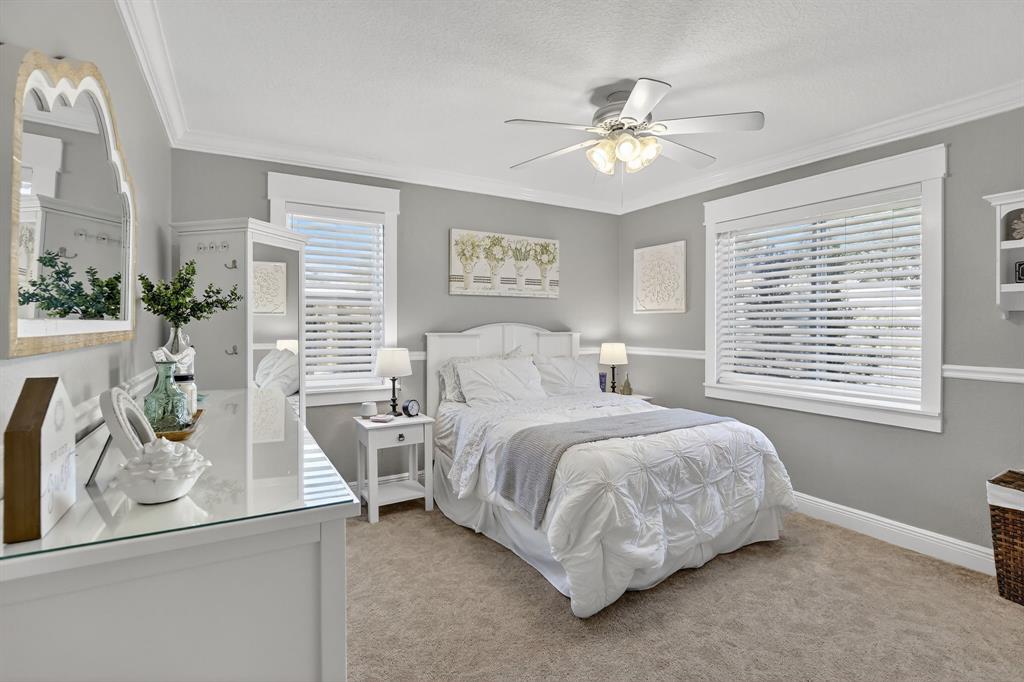 11611 Southwest 52nd Street Cooper City, FL 33330 - Photo 31 of 45 a spacious bedroom with a bed and window