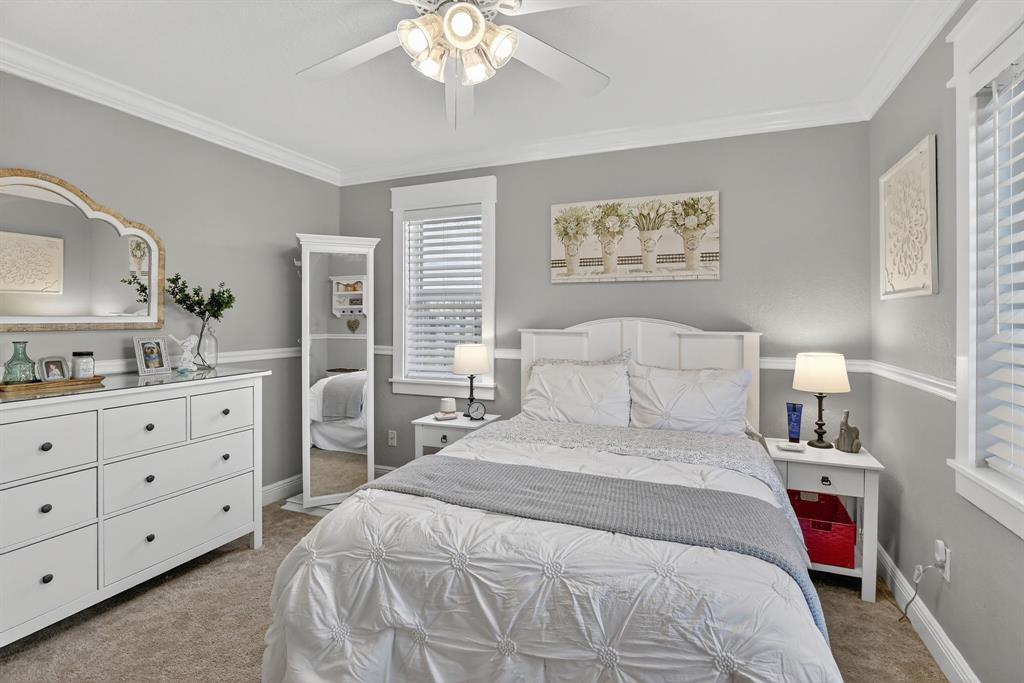 11611 Southwest 52nd Street Cooper City, FL 33330 - Photo 33 of 45 a bedroom with a bed and a dresser