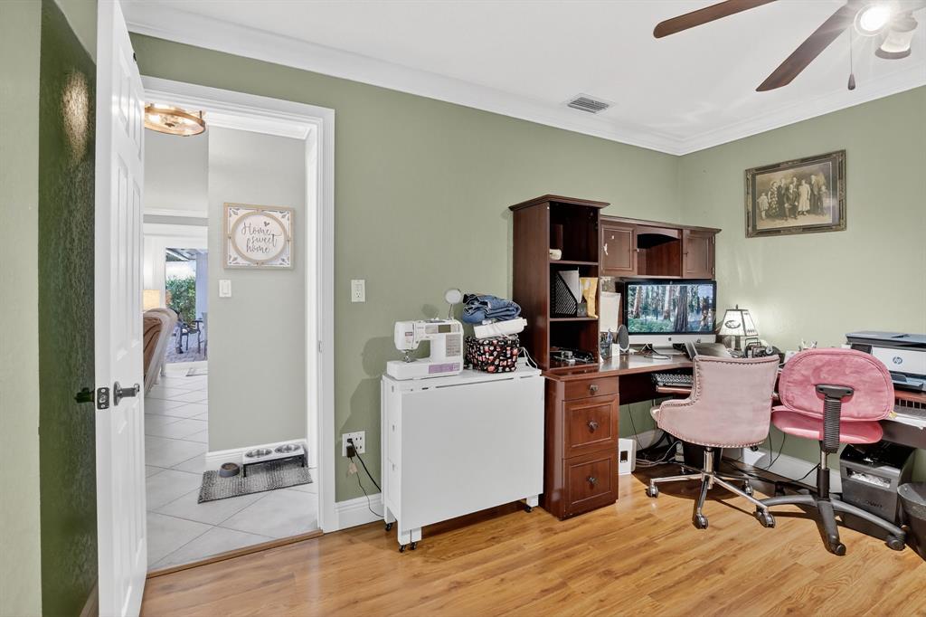 11611 Southwest 52nd Street Cooper City, FL 33330 - Photo 36 of 45 a workspace with furniture and wooden floor