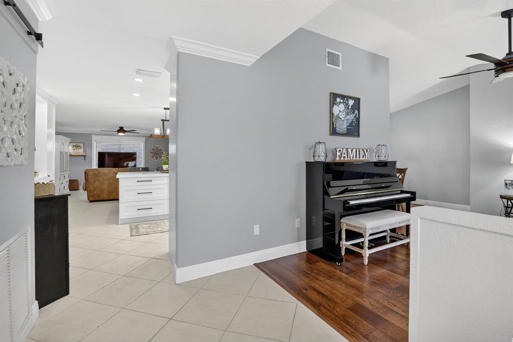 11611 Southwest 52nd Street Cooper City, FL 33330 - Photo 4 of 45 a view of kitchen with furniture and wooden floor