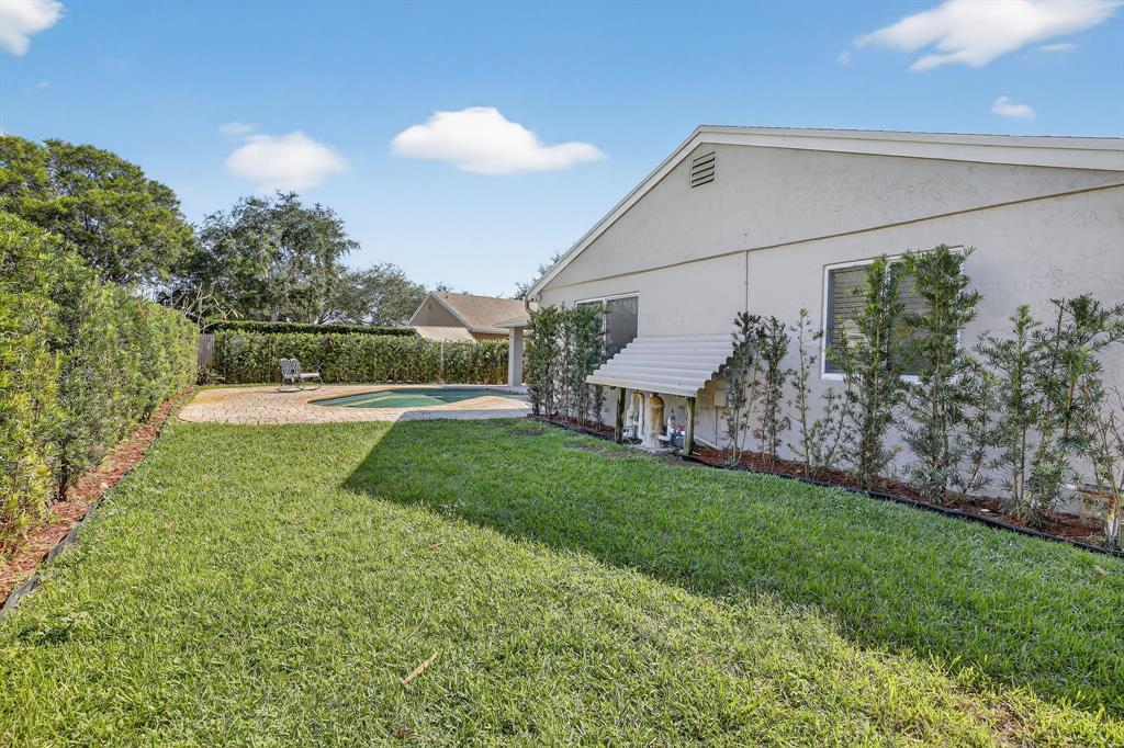 11611 Southwest 52nd Street Cooper City, FL 33330 - Photo 42 of 45 a view of a back yard