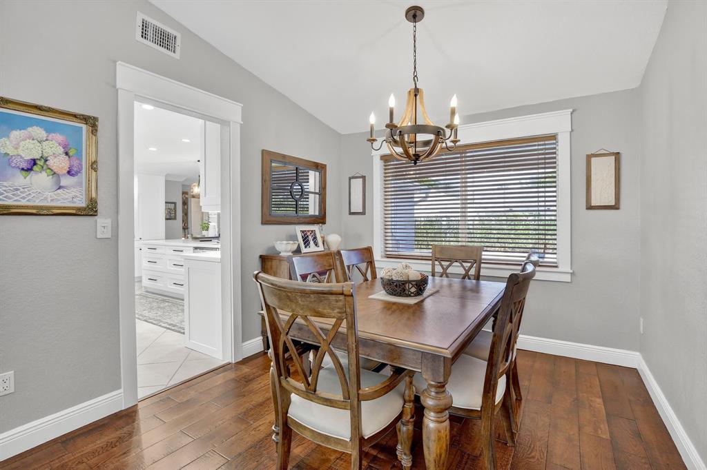 11611 Southwest 52nd Street Cooper City, FL 33330 - Photo 9 of 45 a view of a dining room with furniture window and wooden floor