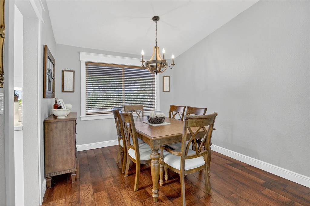 11611 Southwest 52nd Street Cooper City, FL 33330 - Photo 10 of 45 a view of a dining room with furniture window and wooden floor