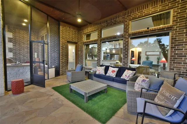 an aerial view of a house with a lake view