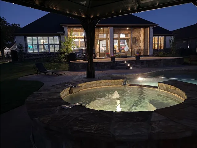 a view of a park with large trees