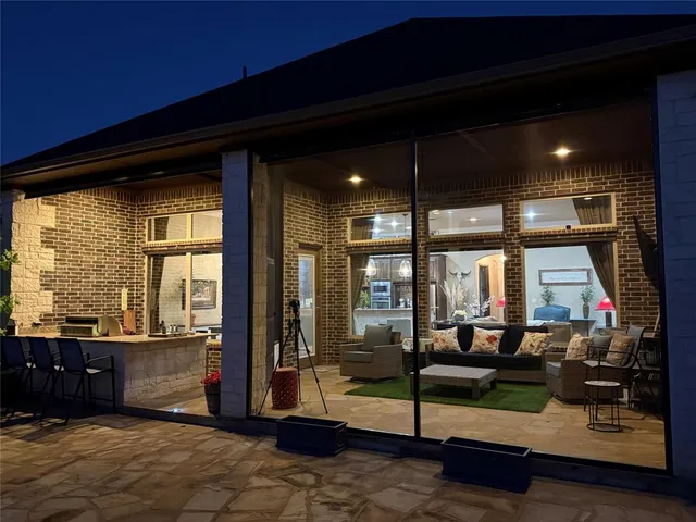 a view of a bench in the backyard