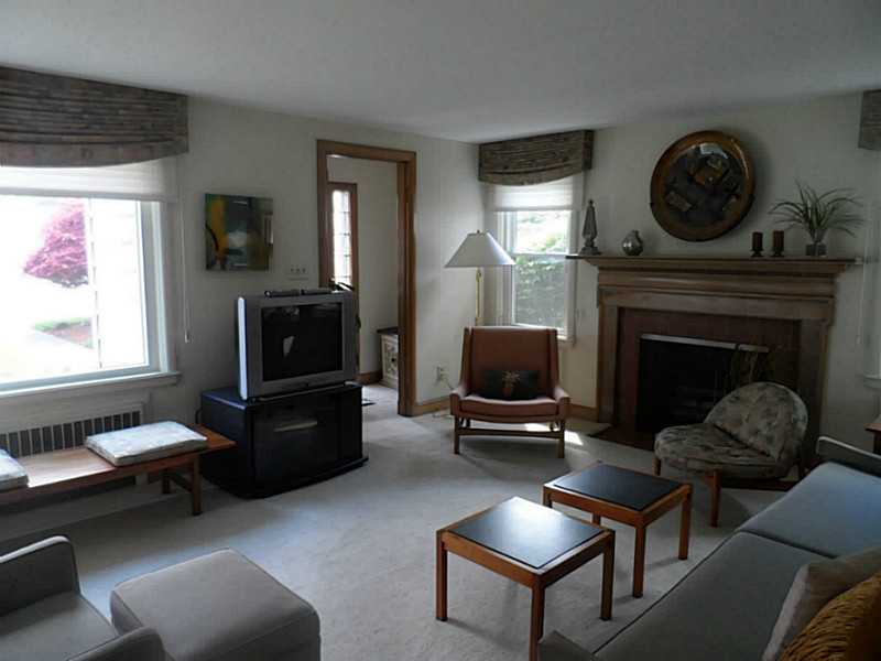 15 Jackson Road Cranston, RI 02920 - Photo 6 of 9 Living Room. living room has wood burning fireplace.
