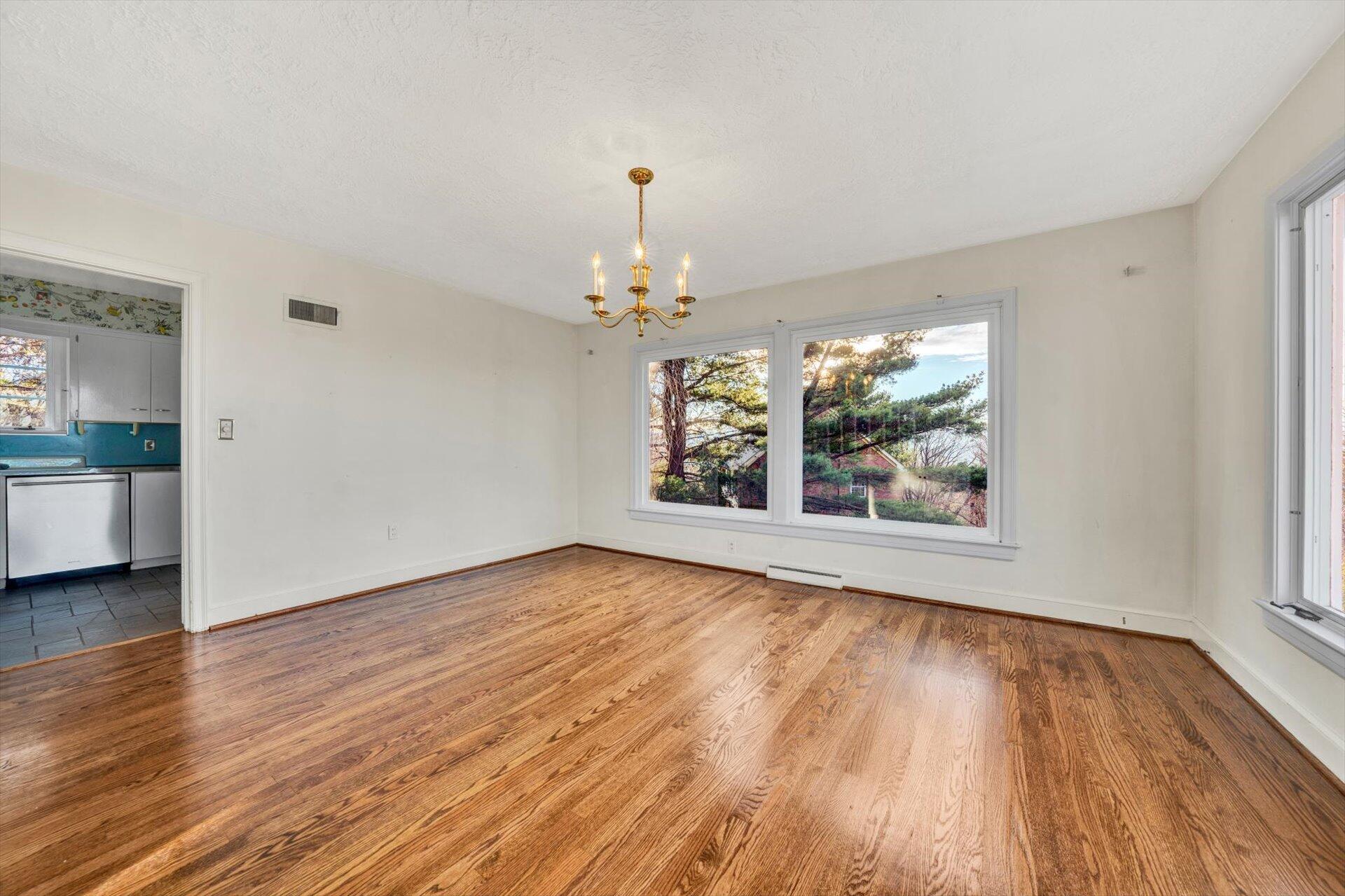 3442 West Ridge Road Southwest Roanoke, VA 24014 - Photo 10 of 42 a view of livingroom with window and wooden floor