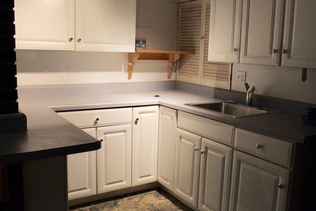 471 County Road Slickville, PA 15684 - Photo 16 of 25 Kitchenette in the basement; this is a great space to host your parties and family get togethers.