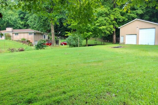 471 County Road Slickville, PA 15684 - Photo 25 of 25 Welcome to tranquility in this property. 1 car integral garage in the home; and the out building holds the overflow. Plenty of space to roam.