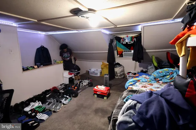 a backyard of a house with outdoor seating