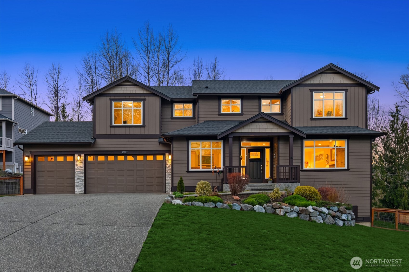 20927 60th Street Southeast Snohomish, WA 98290 - Photo 1 of 40 a front view of a house with garden