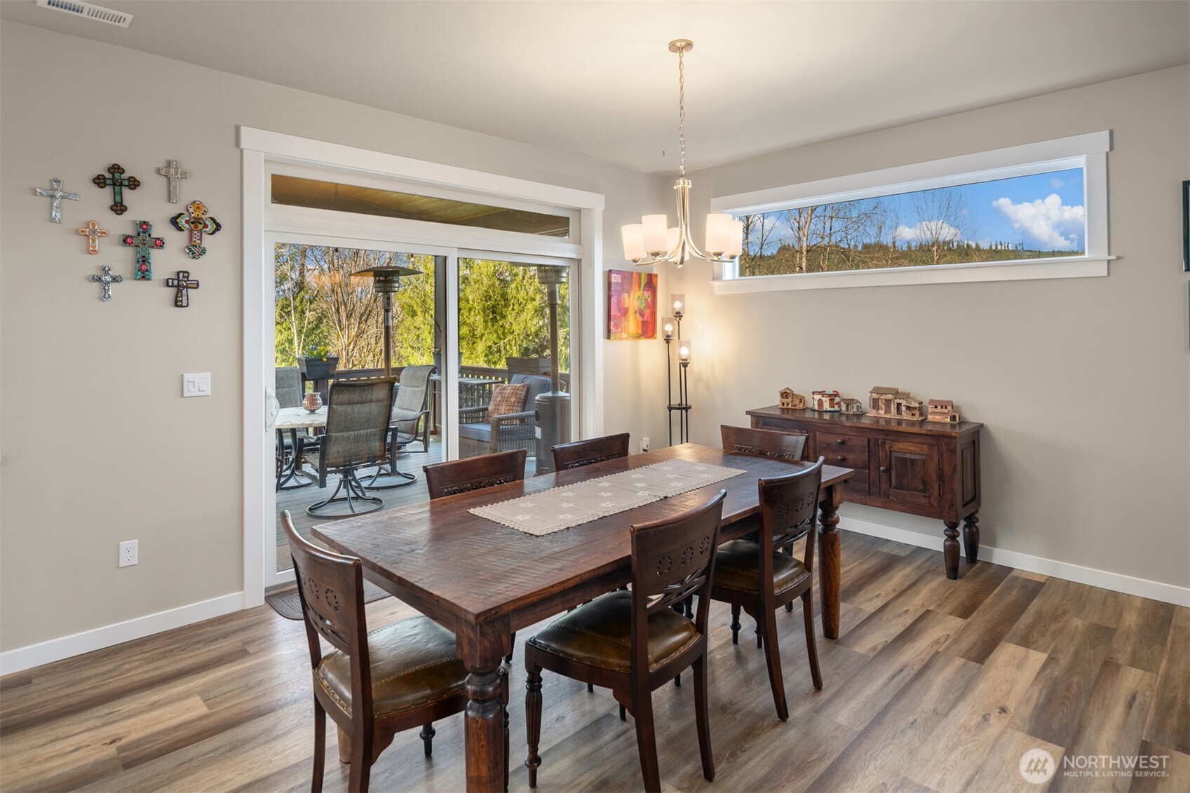 20927 60th Street Southeast Snohomish, WA 98290 - Photo 14 of 40 a view of a dining room with furniture window and wooden floor