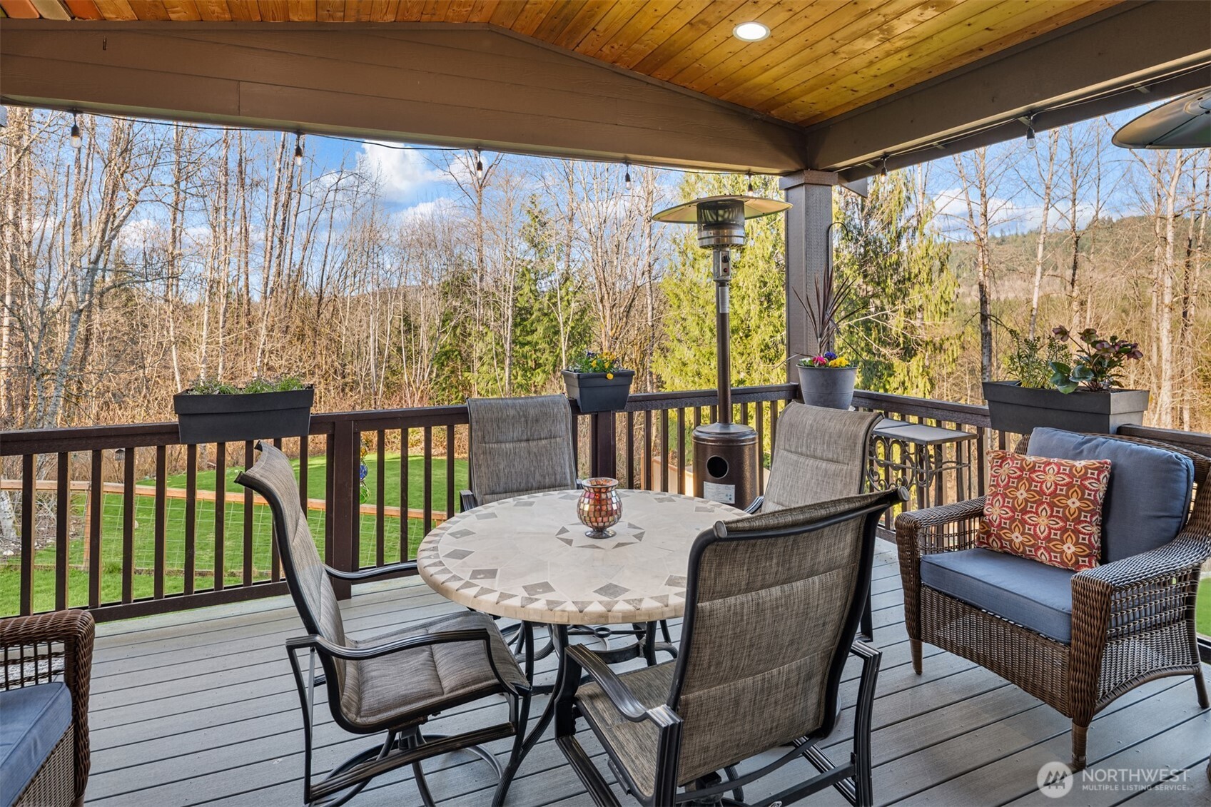 20927 60th Street Southeast Snohomish, WA 98290 - Photo 15 of 40 a view of a chairs and table in the balcony