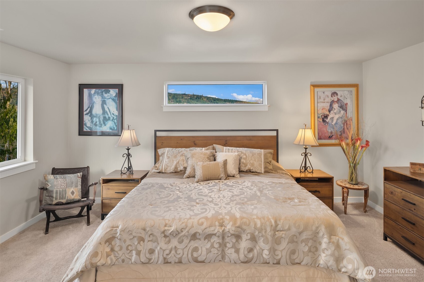 20927 60th Street Southeast Snohomish, WA 98290 - Photo 20 of 40 a bedroom with a bed and wooden floor
