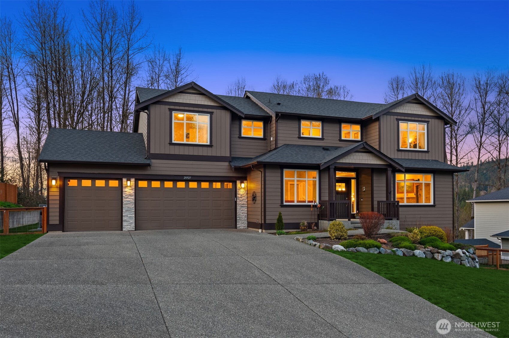 20927 60th Street Southeast Snohomish, WA 98290 - Photo 2 of 40 a front view of building with a yard