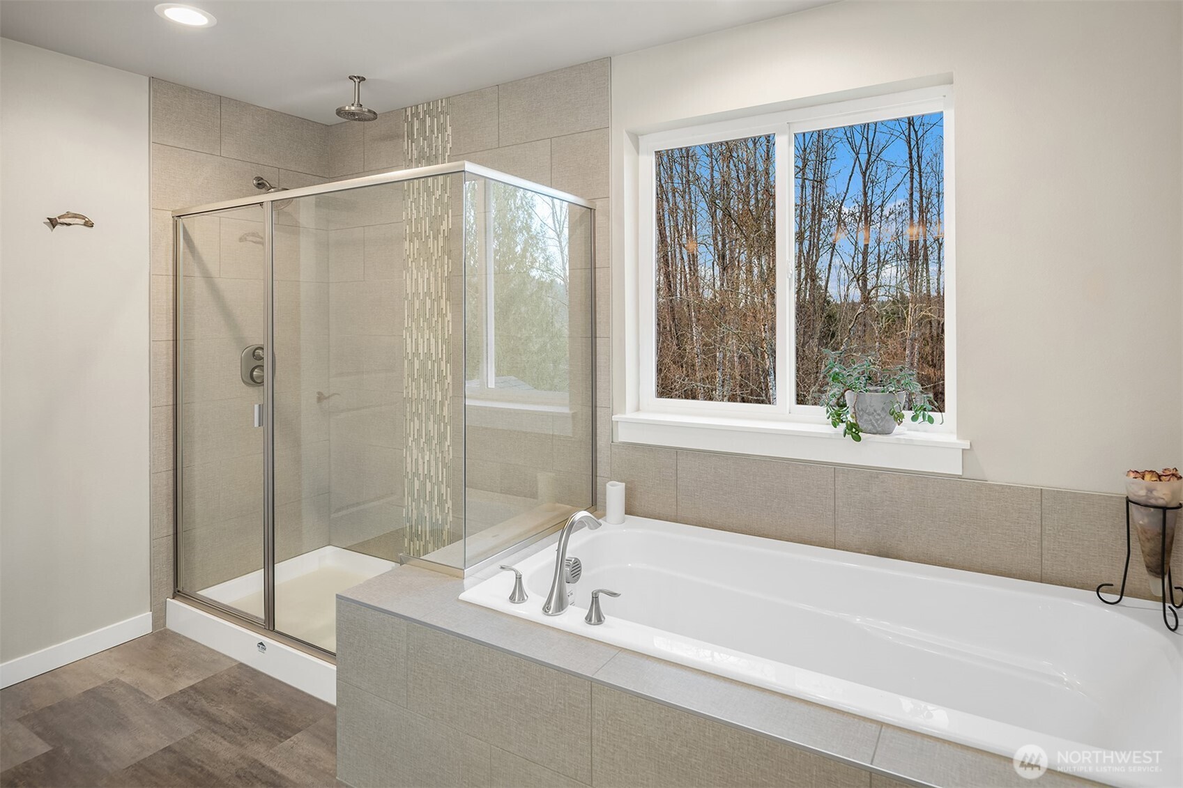 20927 60th Street Southeast Snohomish, WA 98290 - Photo 22 of 40 a bathroom with a bathtub and a shower