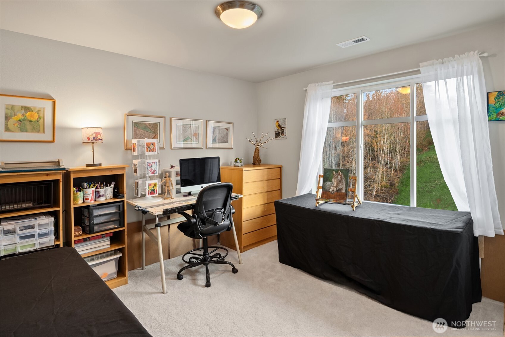 20927 60th Street Southeast Snohomish, WA 98290 - Photo 23 of 40 a view of a workspace with furniture and a window