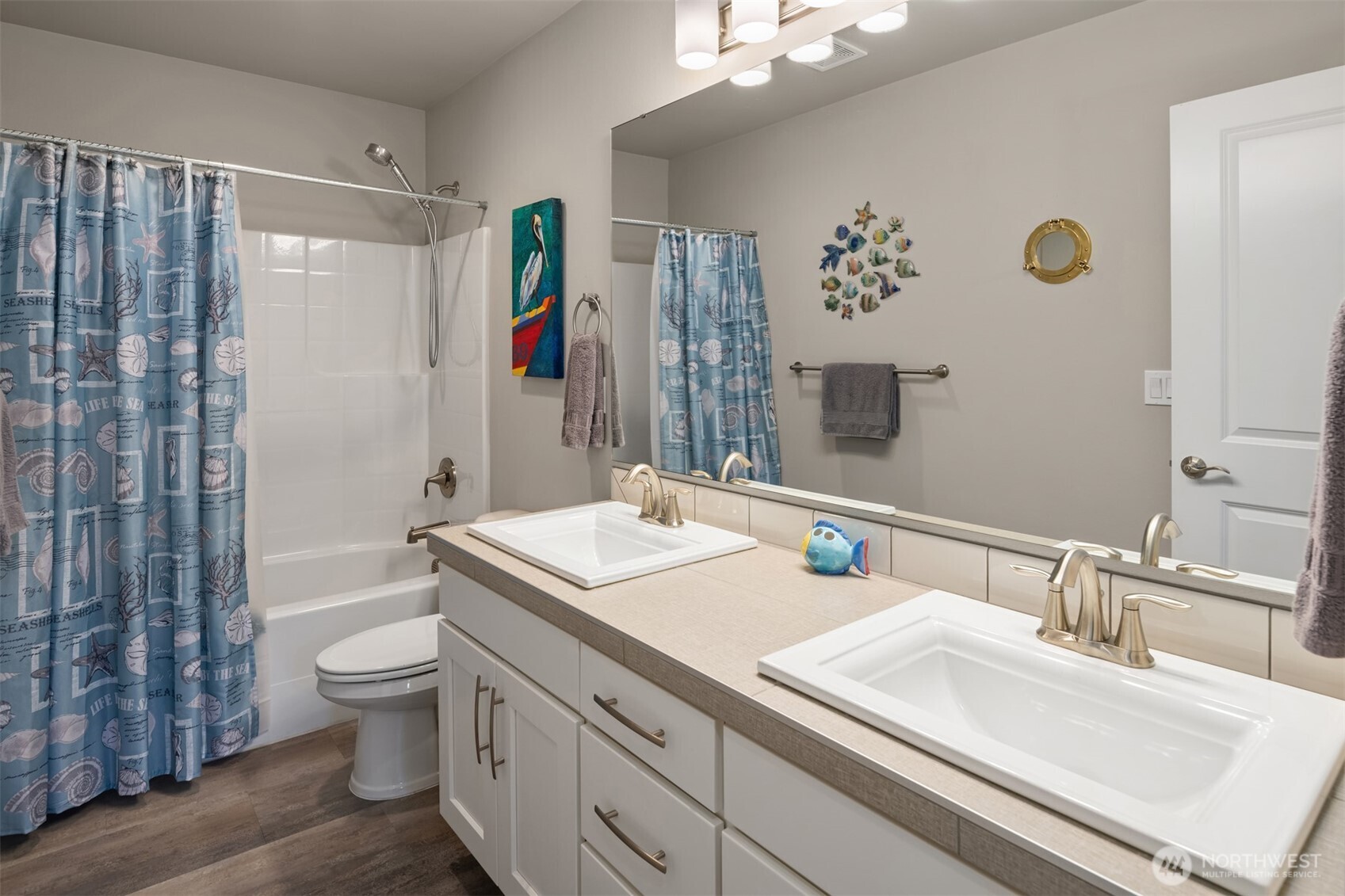 20927 60th Street Southeast Snohomish, WA 98290 - Photo 26 of 40 a bathroom with a double vanity sink toilet and shower