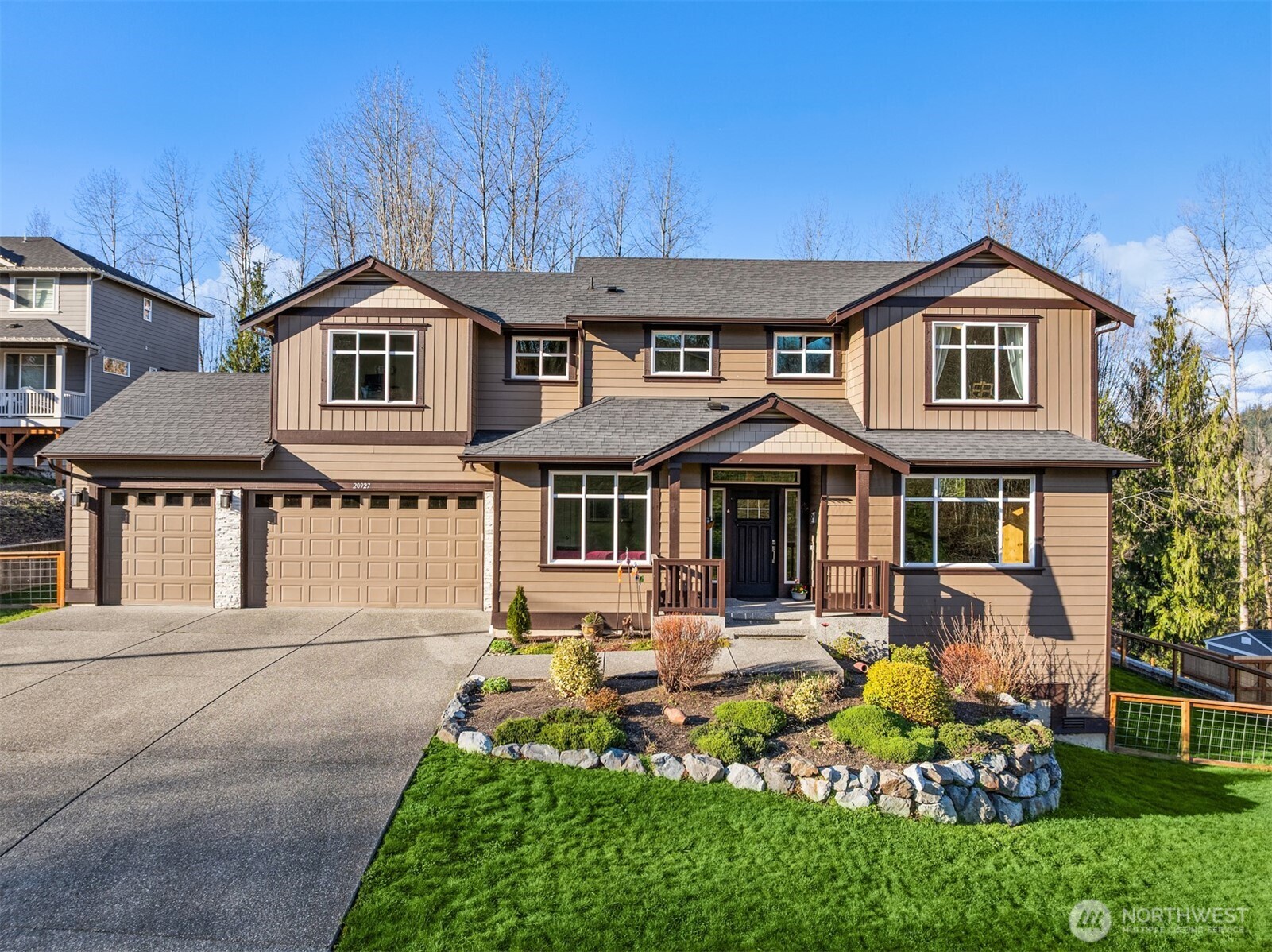20927 60th Street Southeast Snohomish, WA 98290 - Photo 40 of 40 a front view of a house with a yard