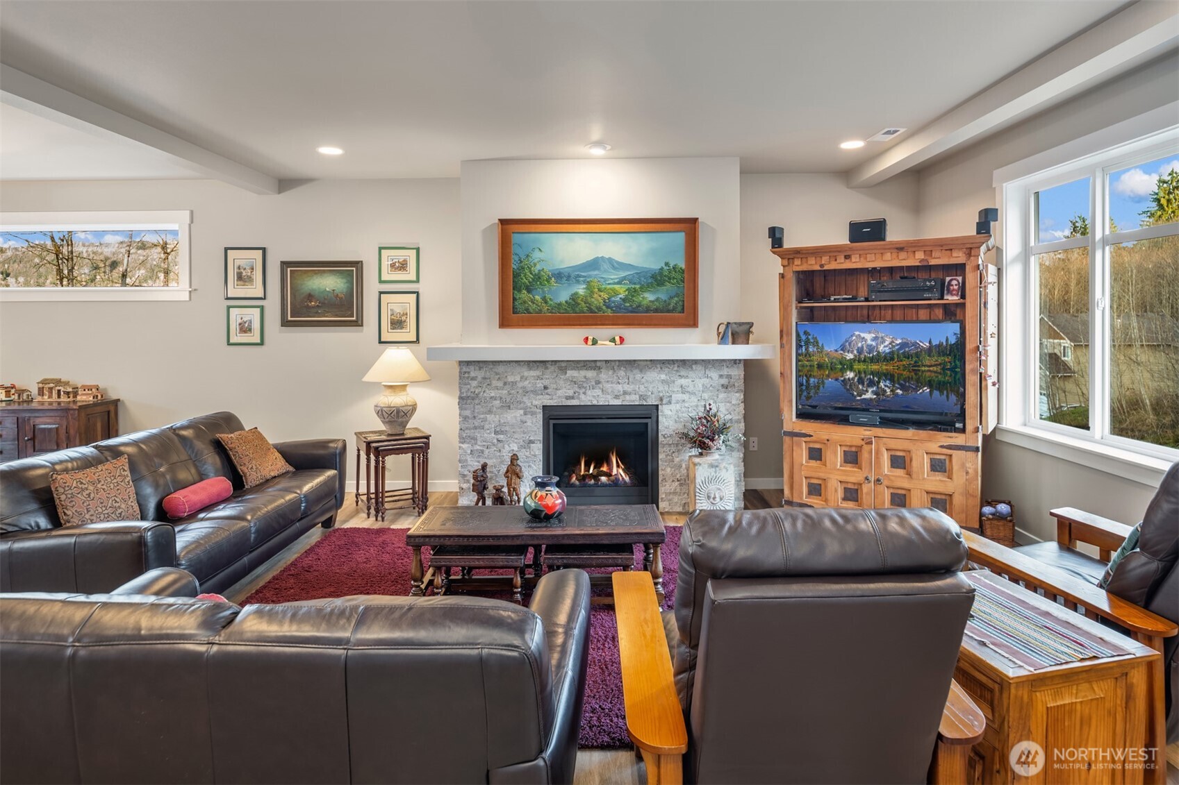 20927 60th Street Southeast Snohomish, WA 98290 - Photo 5 of 40 a living room with furniture and a flat screen tv