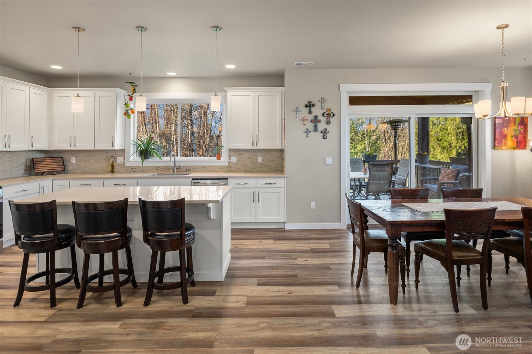 20927 60th Street Southeast Snohomish, WA 98290 - Photo 9 of 40 a large kitchen with dining table and chairs