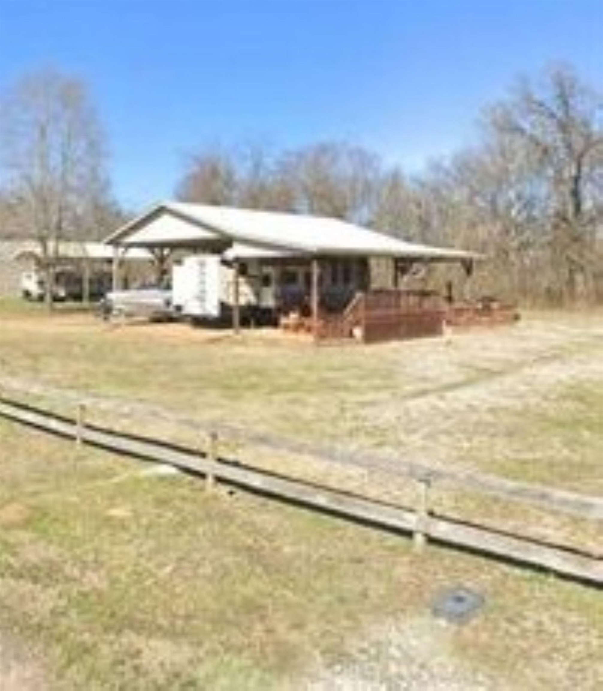 3000 Bridgeview Lane Crump, TN 38327 - Photo 4 of 5 a view of a house with a swimming pool