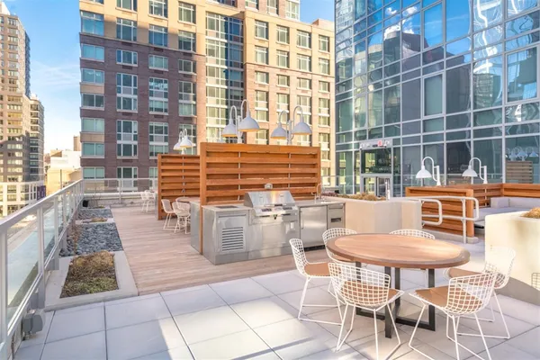 a outdoor space with swimming pool and sitting space