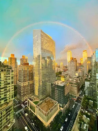 a view of a dining area with furniture window and wooden floor
