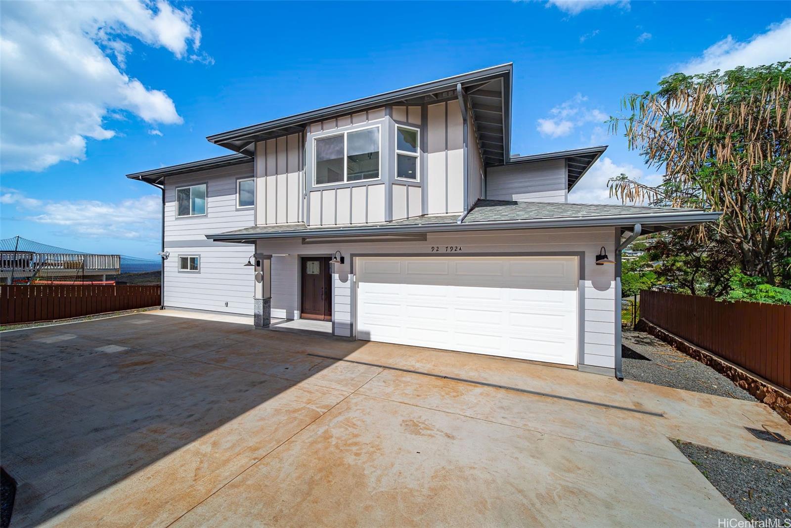 92-792 A Ahikoe Street Kapolei, HI 96707 - Photo 1 of 25 a front view of a house with yard