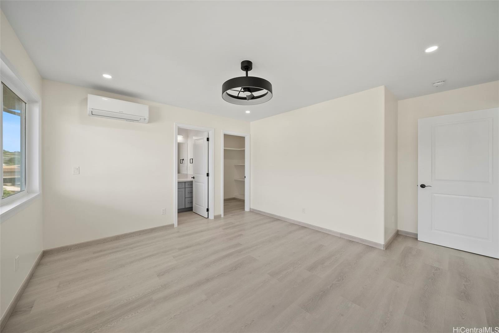 92-792 A Ahikoe Street Kapolei, HI 96707 - Photo 10 of 25 a view of an empty room with ceiling fan