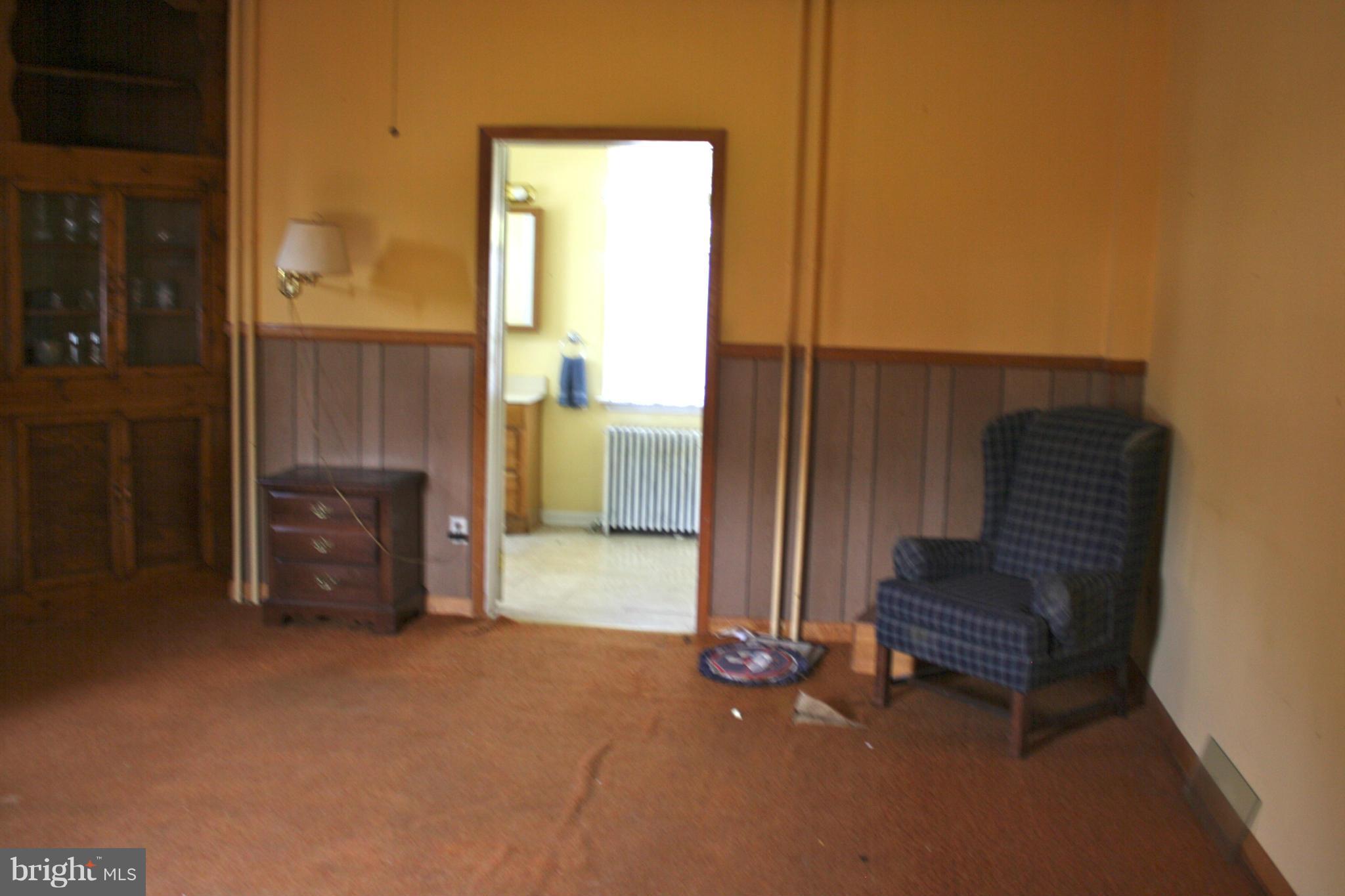 4622 East Joppa Road Perry Hall, MD 21128 - Photo 12 of 29 a view of an empty room with a fireplace