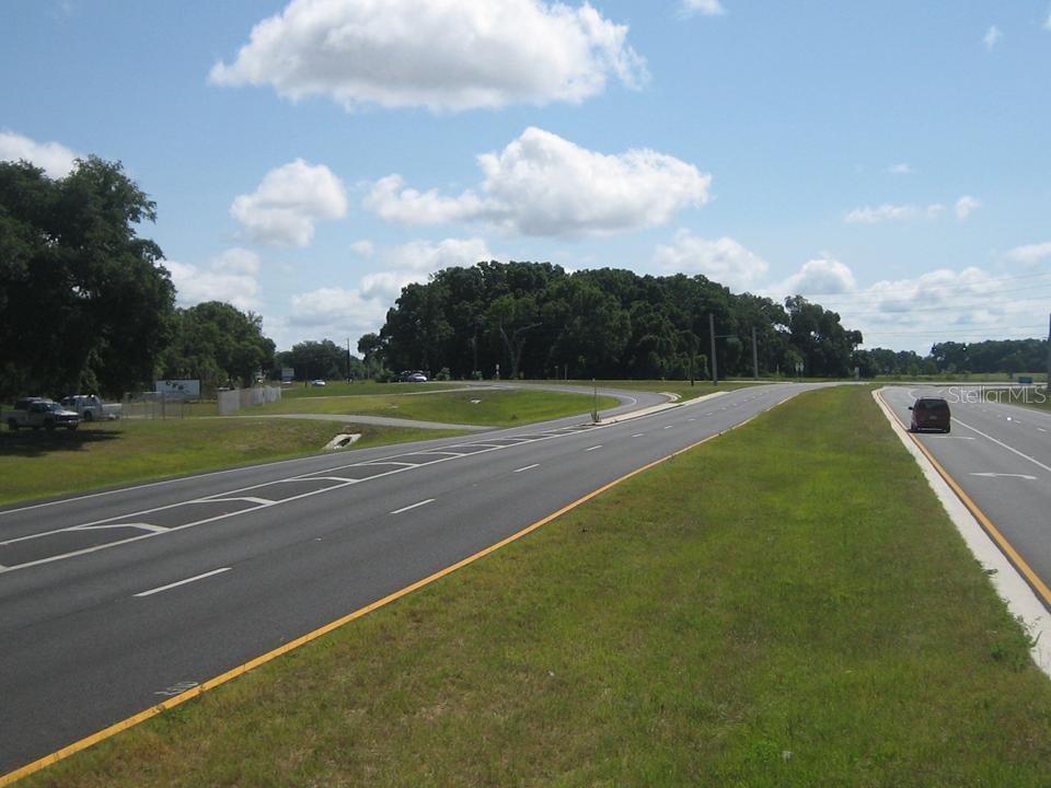 0 Southeast 132nd St Road Belleview, FL 34420 - Photo 3 of 3 a view of a golf course with a lake