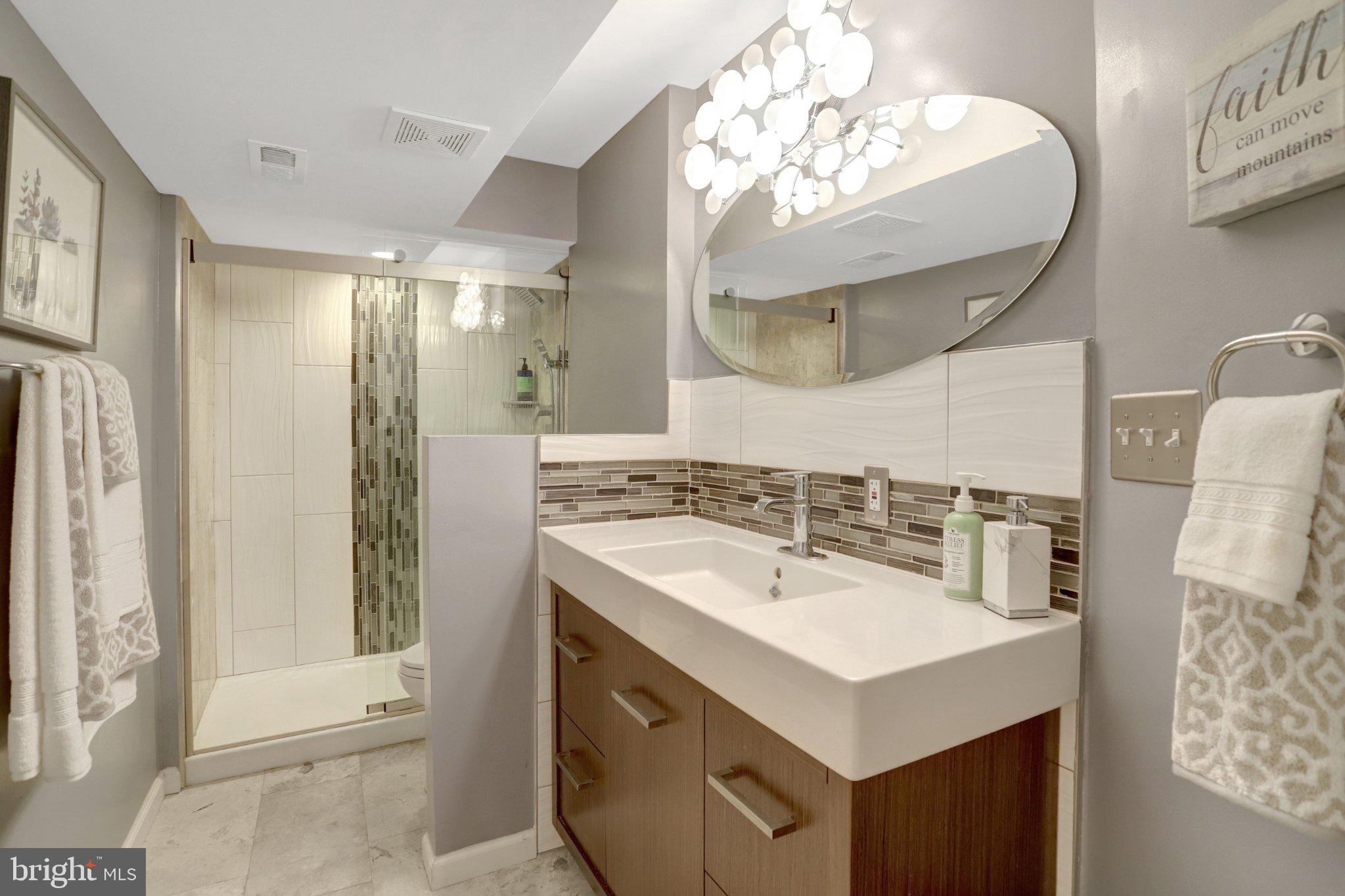 9219 Fort Foote Road Fort Washington, MD 20744 - Photo 50 of 68 Modern elegance in a serene bathroom.