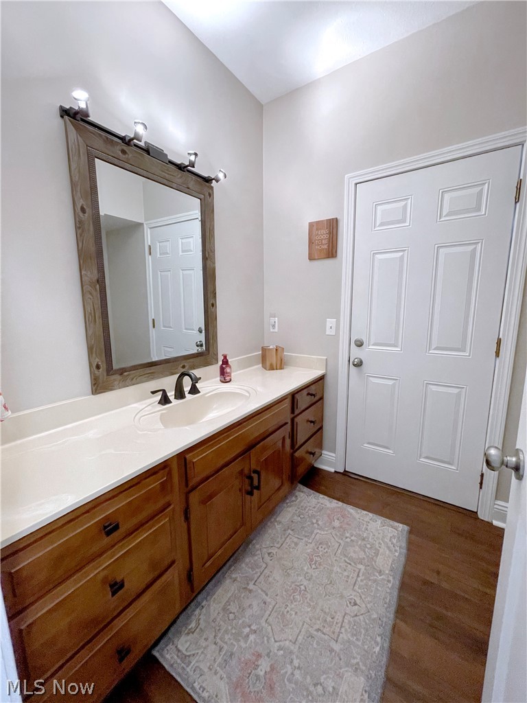 718 Sunridge Road Fairlawn, OH 44333 - Photo 24 of 49 Bathroom featuring vanity and hardwood / wood-style floors