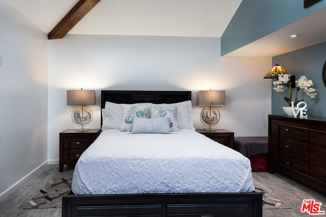 8308 Flight Avenue, Unit ADU Los Angeles, CA 90045 - Photo 15 of 27 a bedroom with a bed and a dresser