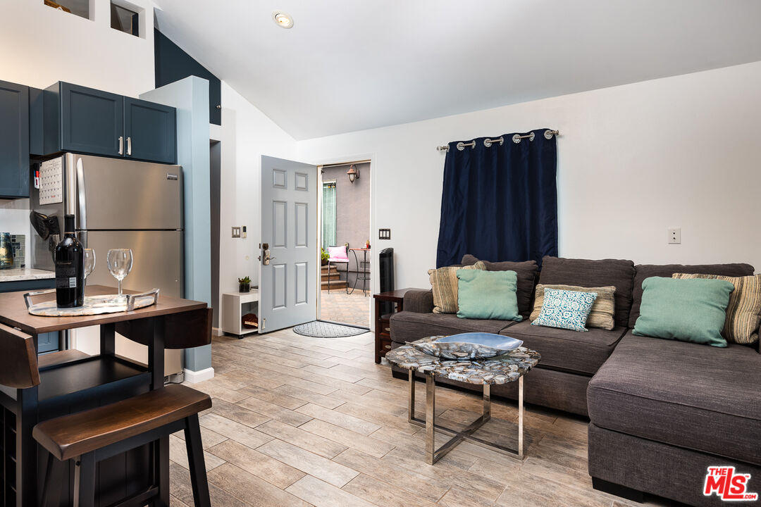 8308 Flight Avenue, Unit ADU Los Angeles, CA 90045 - Photo 7 of 27 a living room with furniture a rug and a table