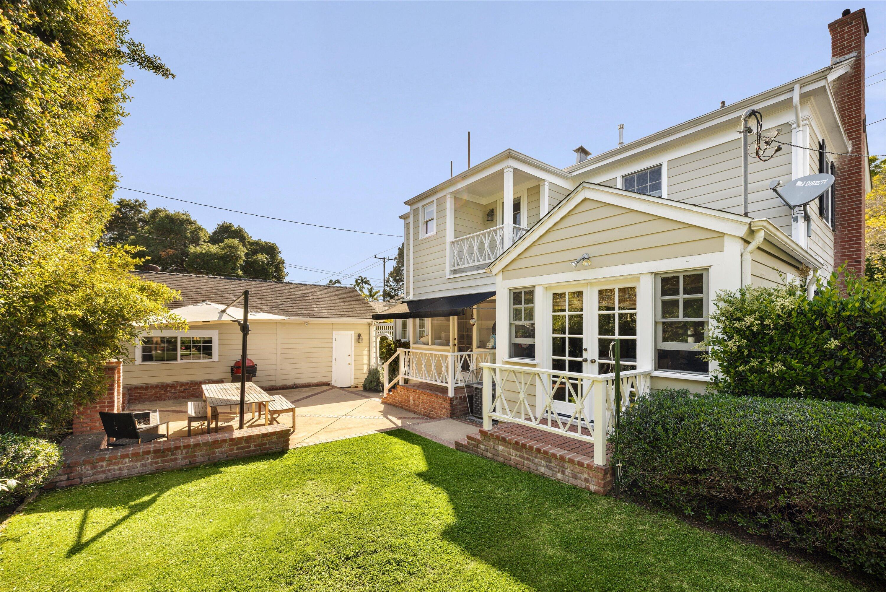 22 East Islay Street Santa Barbara, CA 93101 - Photo 24 of 26 a view of a house with a yard patio and swimming pool
