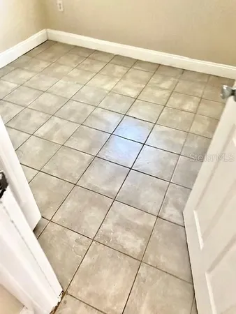 a view of a room with white walls