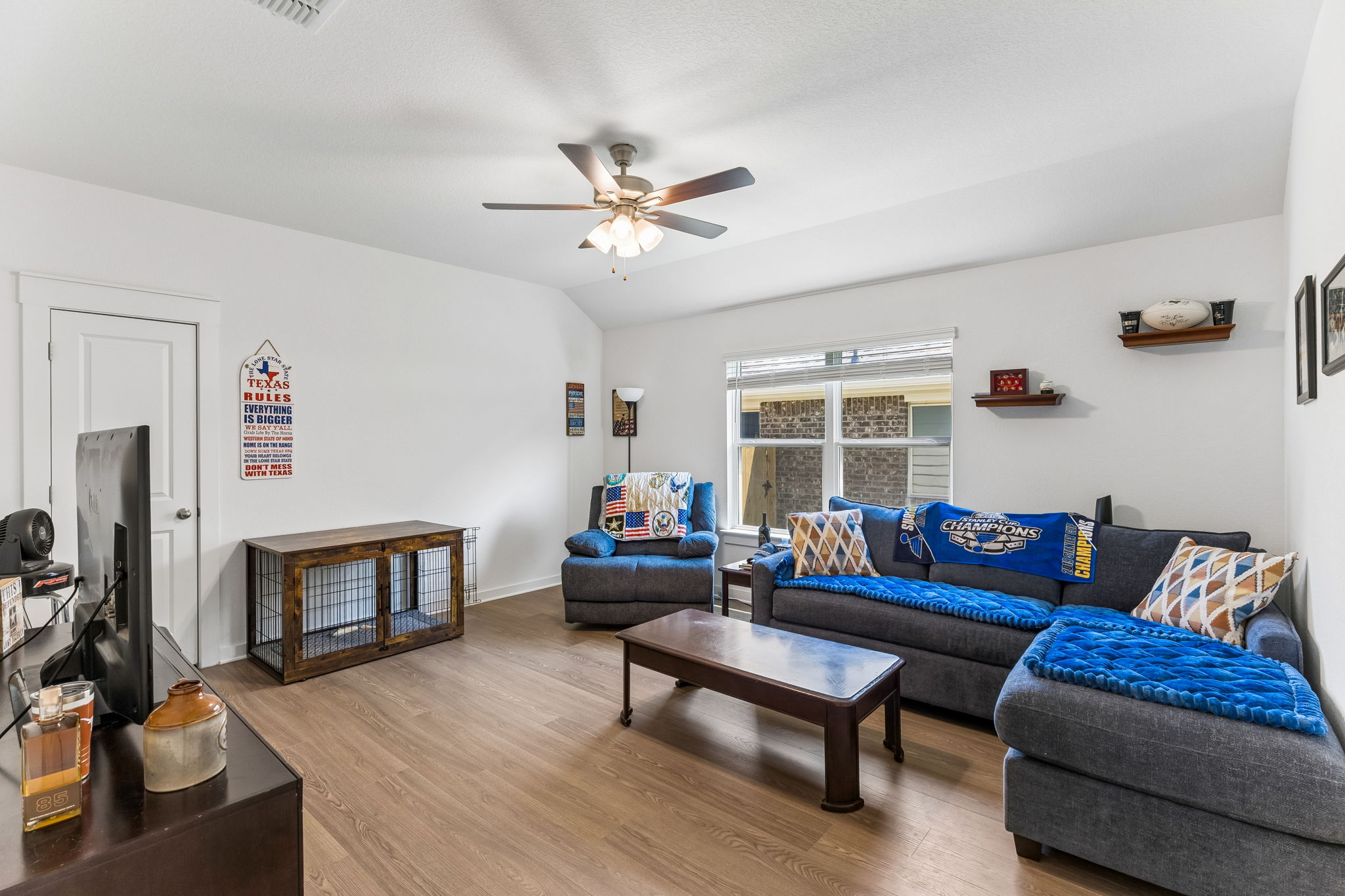 13509 Barn Chime Street Elgin, TX 78621 - Photo 25 of 40 Open concept living area featuring wood-finish flooring, a ceiling fan, and recessed lighting