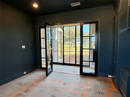 a bed room with a bed and a window