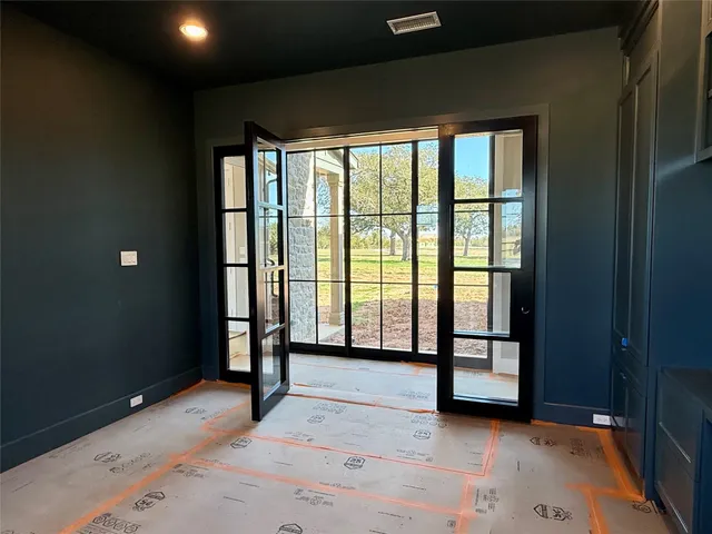 a bed room with a bed and a window