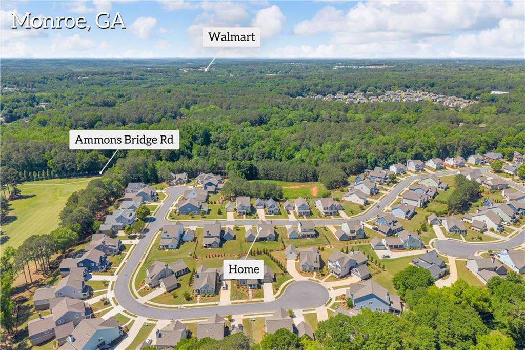 943 Clubside Drive Monroe, GA 30655 - Photo 22 of 24 an aerial view of residential house with outdoor space